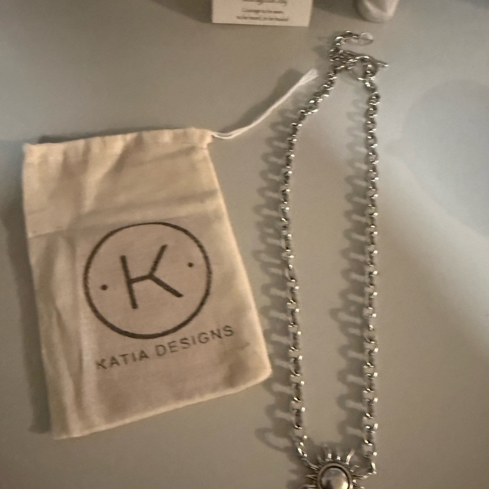 Sunburst necklace, brand new, never worn.